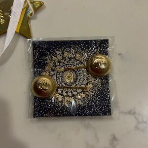 Gold Chanel hair clips